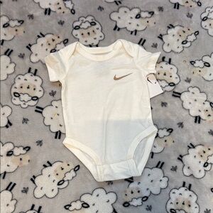 Nike Cream Bodysuit Soft and Minimalist